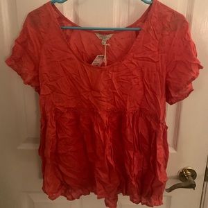 Peplum eyelet red top